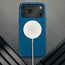 MagSafe charger attached to the Slimline Cobalt Blue Leather Bumper Case for iPhone 17 Pro