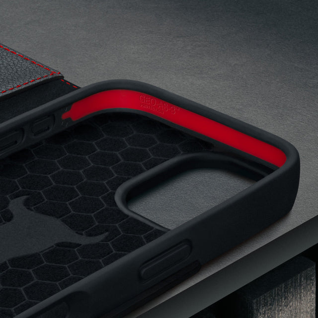 Microfibre lined frame of the Black (with Red Detail) Leather Case for iPhone 17