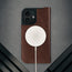 MagSafe charger attached to the Dark Brown Leather Case for iPhone 17