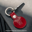 Red Leather Apple AirTag Holder Keyring attached to keyring