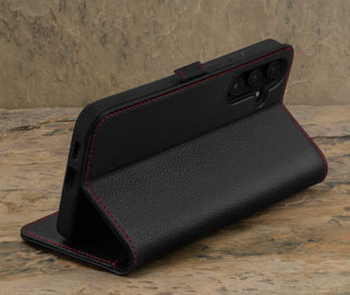 Stand function of the Black with Red Detail Leather Wallet Case for Samsung Galaxy S24 Plus