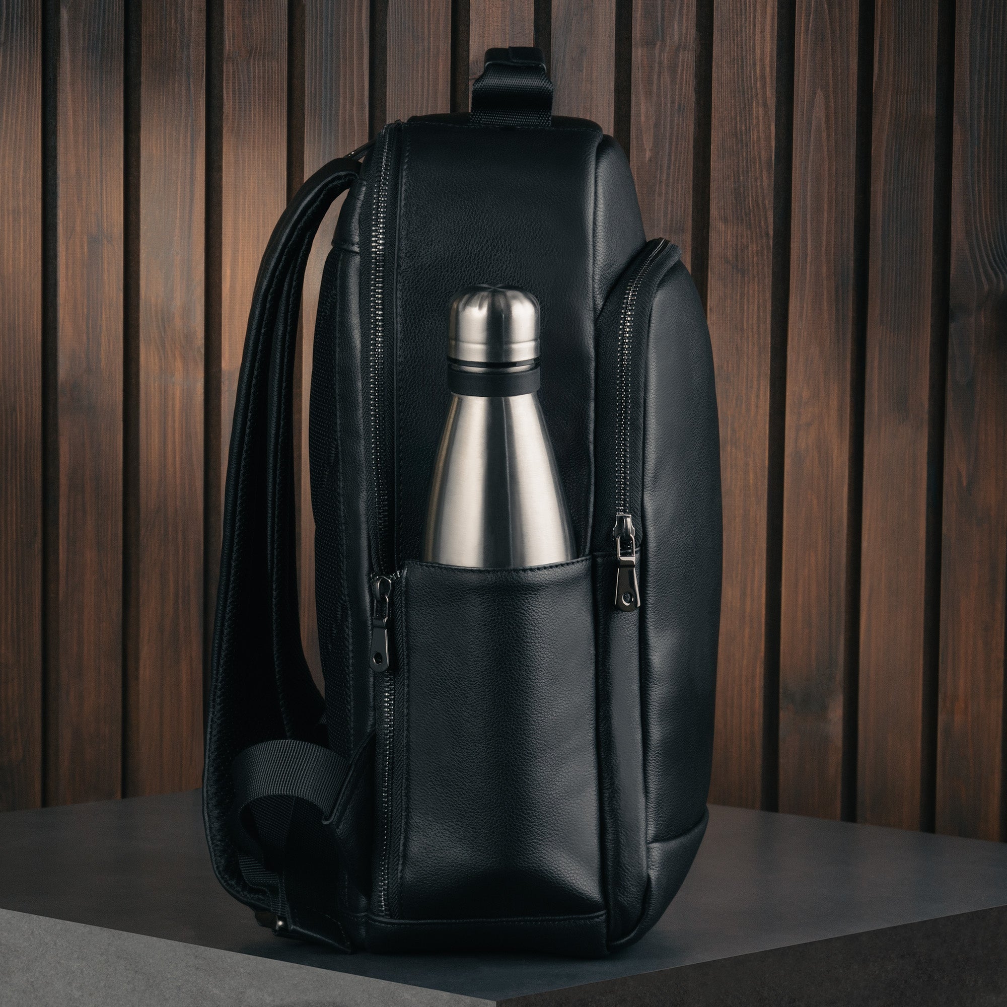 Leather backpack with water bottle holder sale