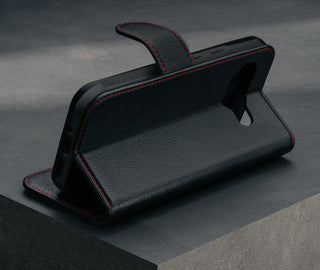 Stand function of the Black with Red Detail Leather Wallet Case for Google Pixel 9a