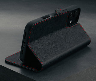 Stand function on the Black with Red Stitching Leather Case for iPhone 16 Plus