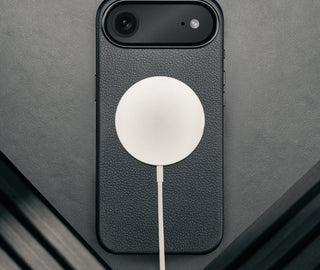 MagSafe charger attached to the Black Leather Bumper Case for iPhone 17 Air