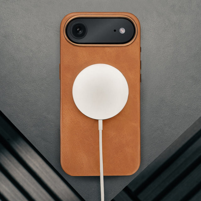 MagSafe charger attached to the Tan Leather Bumper Case for iPhone 17 Air