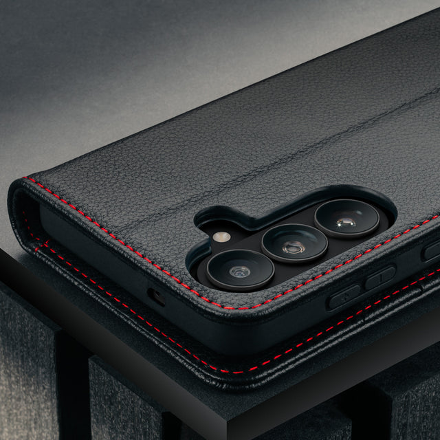Camera cutout of the Black with Red Detail Leather Case for Galaxy S25 FE