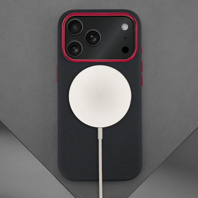 Wireless charager connected to the Black with Red Detail Woven Fabric Bumper Case for iPhone 17 Pro Max