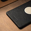 Close up of TORRO logo on Leather Magsafe Charging Dock with magsafe charger sitting flush