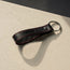 Contextual Front of Black Leather (with red stitching) keyring