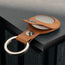 Close up of the press stud clasp on the Tan Leather Apple AirTag Holder Keyring