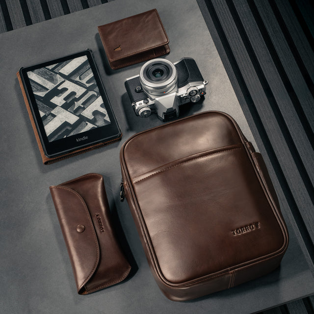 Dark Brown Leather Crossbody Shoulder Satchel Bag with items to show size and capacity