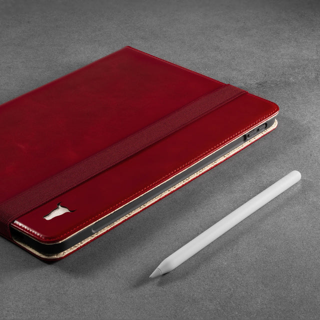 Indented groove on the inner frame of the Red Leather Case for iPad Air allowing the Apple Pencil to magnetically attach and charge